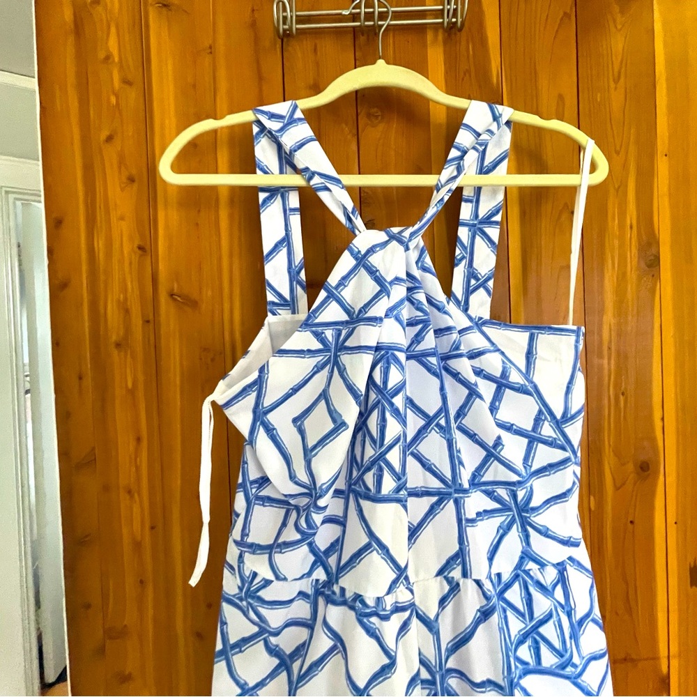 Halter style jumpsuit white w blue design.